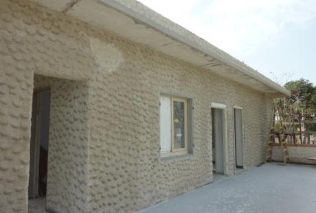 שחזור טיח "כפות", בתהליך הביצוע 